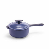 Blue 2-quart enameled cast iron saucepan with lid by BUCHYMIX Nigeria, showing the smooth enamel finish and sturdy handle.