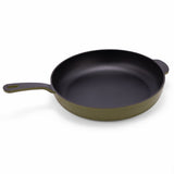 Green enameled cast iron skillet by BUCHYMIX NIGERIA, showcasing a smooth, durable cooking surface and sturdy handle.