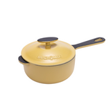 Yellow 2-quart enameled cast iron saucepan with lid by BUCHYMIX Nigeria, showing the smooth yellow enamel surface and sturdy handle.