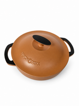 Enameled cast iron braiser by BUCHYMIX NIGERIA, 5-quart capacity, with a colorful lid and sturdy handles for versatile cooking.