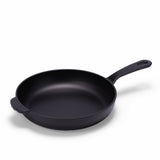 Black enameled cast iron skillet by BUCHYMIX NIGERIA, showing a smooth, glossy coating and sturdy handle for versatile cooking.
