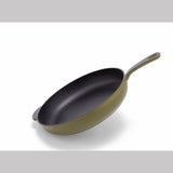 Green enameled cast iron skillet by BUCHYMIX Nigeria, showing a smooth, durable cooking surface and sturdy handle.