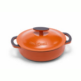 Orange enameled cast iron braiser by BUCHYMIX NIGERIA, 5-quart size, showcasing a glossy, smooth enamel finish and sturdy handle.