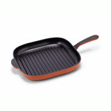 Orange 12-inch enameled cast iron grill pan by BUCHYMIX Nigeria, with ridged surface for grilling and easy-to-clean enamel coating.