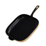 Yellow 12-inch enameled cast iron grill pan by BUCHYMIX NIGERIA with ridged cooking surface and sturdy handle.